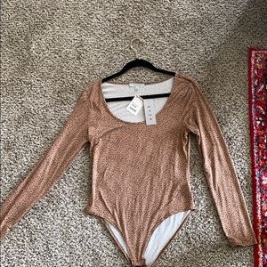 NEVER WORN/TAGS ON cheetah long sleeve body suit